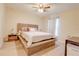 Neutral bedroom with a king-sized bed, natural light, and bedside tables at 15303 Sw 52Nd Cir, Ocala, FL 34473