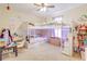 Colorful bedroom featuring a bunkbed, shelving, desk and plenty of natural light at 15303 Sw 52Nd Cir, Ocala, FL 34473