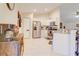 Well-equipped kitchen featuring modern appliances, light-colored cabinetry, and a pantry at 15303 Sw 52Nd Cir, Ocala, FL 34473
