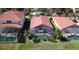 Aerial view showcases the home's private pool, fully-screened lanai and backyard at 156 Carrera Ave, Davenport, FL 33897