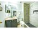 Well-maintained bathroom with a shower, vanity, and tiled floor; designed for comfort and functionality at 156 Carrera Ave, Davenport, FL 33897