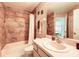 Functional bathroom featuring a shower, vanity, and tiled floor, providing a clean and comfortable space at 156 Carrera Ave, Davenport, FL 33897