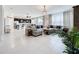 Spacious open-concept living area connecting the kitchen and living room, great for entertaining at 15865 Bradicks Ct, Clermont, FL 34711