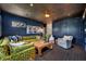 Comfortable living room featuring a custom bookshelf, designer furniture, and stylish decor at 1602 Alabama Dr # Ph404, Winter Park, FL 32789