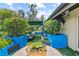 Lush rooftop patio featuring manicured bushes and furniture for outdoor relaxation at 1602 Alabama Dr # Ph404, Winter Park, FL 32789