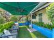 Stylish rooftop terrace offers a shady spot to relax with ample seating and greenery at 1602 Alabama Dr # Ph404, Winter Park, FL 32789