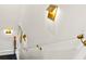 Modern stairway with acrylic handrail, artistic lighting, and neutral colors at 1602 Alabama Dr # Ph404, Winter Park, FL 32789