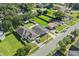 An aerial view of several homes with large yards and mature trees in a quiet residential neighborhood at 1623 Cumbie Ave, Orlando, FL 32804