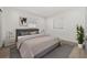 Cozy bedroom featuring a gray accent rug and modern decor at 1623 Cumbie Ave, Orlando, FL 32804