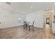 Cozy dining area with modern flooring, minimalist decor, and bright natural light at 1623 Cumbie Ave, Orlando, FL 32804