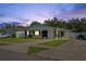 Charming single-story home with a well-manicured lawn, swing, and spacious driveway at 1623 Cumbie Ave, Orlando, FL 32804