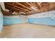 Spacious garage interior with exposed beams and concrete flooring at 1623 Cumbie Ave, Orlando, FL 32804
