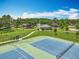 Aerial view features park with tennis courts, playgrounds, picnic pavilions and fountain lake offers recreation options at 16724 Cedar Crest Dr, Orlando, FL 32828