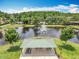 Aerial view of community pavilion overlooking the fountain with picnic benches and green space at 16724 Cedar Crest Dr, Orlando, FL 32828