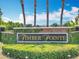 The Timber Pointe community sign with a brick retaining wall and attractive greenery at 16724 Cedar Crest Dr, Orlando, FL 32828