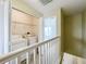 Second floor laundry room features a washer, dryer, and shelving for storage convenience at 16724 Cedar Crest Dr, Orlando, FL 32828