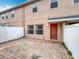 Fenced-in brick patio with exterior door at 16724 Cedar Crest Dr, Orlando, FL 32828