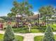 Well-maintained community playground with landscaping and sidewalks at 16724 Cedar Crest Dr, Orlando, FL 32828
