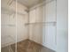 A walk-in closet with installed shelving and carpeting at 16724 Cedar Crest Dr, Orlando, FL 32828