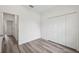 Bedroom features modern floors and closet at 16904 Sw 30Th Avenue Rd, Ocala, FL 34473