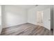 Bright bedroom features neutral walls and attractive wood-look floors at 16904 Sw 30Th Avenue Rd, Ocala, FL 34473
