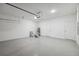 Spacious garage with epoxy floors, painted walls, and garage door opener at 16904 Sw 30Th Avenue Rd, Ocala, FL 34473