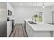 Bright, spacious kitchen featuring stainless steel appliances, a large island, and a view to backyard at 16904 Sw 30Th Avenue Rd, Ocala, FL 34473