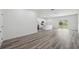 Spacious living room with modern floors and sliders to backyard at 16904 Sw 30Th Avenue Rd, Ocala, FL 34473