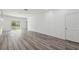 Spacious living room features modern floors and backyard access at 16904 Sw 30Th Avenue Rd, Ocala, FL 34473