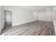 Bright living room boasts neutral walls, recessed lighting, and wood-look floors at 16904 Sw 30Th Avenue Rd, Ocala, FL 34473