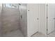 Walk in shower with gray tile at 16904 Sw 30Th Avenue Rd, Ocala, FL 34473