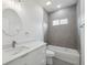 Bathroom featuring a tub, shower with tile surround, modern vanity, and fixtures at 17139 Sw 44Th Cir, Ocala, FL 34473