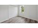 Bedroom featuring hard surface floors and a closet at 17139 Sw 44Th Cir, Ocala, FL 34473