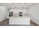 Contemporary kitchen boasting an island, stainless steel appliances, and a minimalist design at 17139 Sw 44Th Cir, Ocala, FL 34473