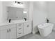 This primary bathroom has dual sinks, a soaking tub and a walk-in shower at 17434 Sw 36Th Avenue Rd, Ocala, FL 34473