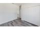 The bedroom features gray flooring and a closet for ample storage at 17434 Sw 36Th Avenue Rd, Ocala, FL 34473