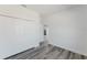 Bright bedroom featuring wood-look flooring and closet with bi-fold doors at 17434 Sw 36Th Avenue Rd, Ocala, FL 34473