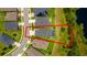 Aerial view of the property showcasing the house, pool, and surrounding landscape at 17840 Passionflower Cir, Clermont, FL 34714