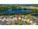 Aerial view of property highlighting location with lake view and community layout at 17840 Passionflower Cir, Clermont, FL 34714