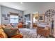 Inviting bonus room with comfortable seating and access to a cozy bedroom at 17840 Passionflower Cir, Clermont, FL 34714