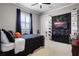 Stylish bedroom featuring a geometric accent wall, shelves, and a modern design at 190 Osprey Hammock Trl, Sanford, FL 32771