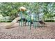 Colorful playground with slides, climbing structures, and a soft landing surface for a fun and safe play area at 190 Osprey Hammock Trl, Sanford, FL 32771
