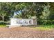 Wekiva Park neighborhood sign surrounded by mature trees creating a tranquil entrance at 190 Osprey Hammock Trl, Sanford, FL 32771