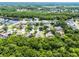 Picturesque single-Gathering homes surrounded by mature trees and nature at 2026 Winding Oaks Dr, Orlando, FL 32825