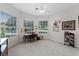 Cozy bedroom with natural light, neutral paint, carpet flooring, and a ceiling fan at 2026 Winding Oaks Dr, Orlando, FL 32825
