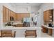 Open concept kitchen with breakfast bar seating and adjacent breakfast nook at 2026 Winding Oaks Dr, Orlando, FL 32825