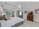 Comfortable main bedroom offering a view of the screened-in patio and a spacious layout at 2026 Winding Oaks Dr, Orlando, FL 32825