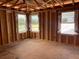 Bright and airy bedroom framed for three windows with plenty of natural light at 2371 Zuni Road, St Cloud, FL 34771