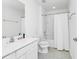 Clean bathroom featuring a shower-tub combination with white tiled floors at 2209 Crofton Ave, Davenport, FL 33837