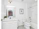 Clean white bathroom featuring a single vanity, toilet, and shower/tub combination at 2209 Crofton Ave, Davenport, FL 33837
